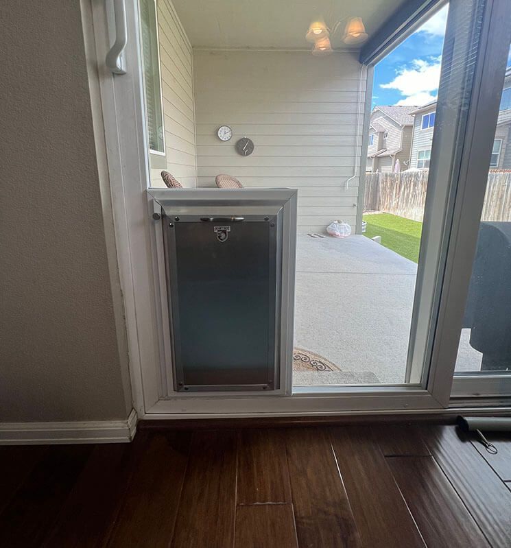 Entry door dog door installation